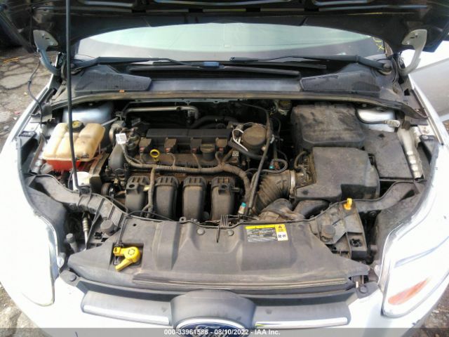 Photo 9 VIN: 1FADP3F27EL243761 - FORD FOCUS 