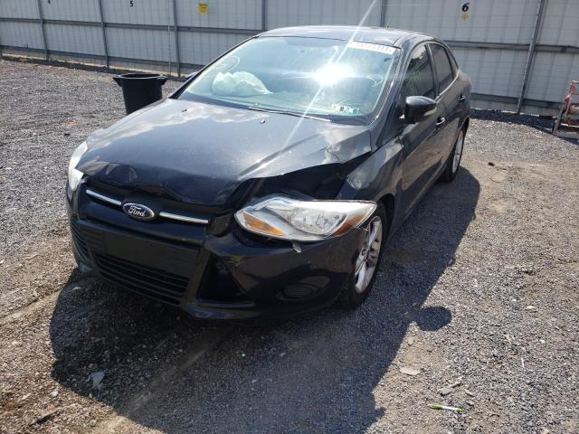 Photo 1 VIN: 1FADP3F27EL262889 - FORD FOCUS SE 