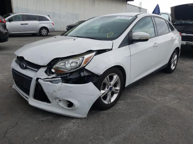 Photo 1 VIN: 1FADP3F27EL294192 - FORD FOCUS SE 