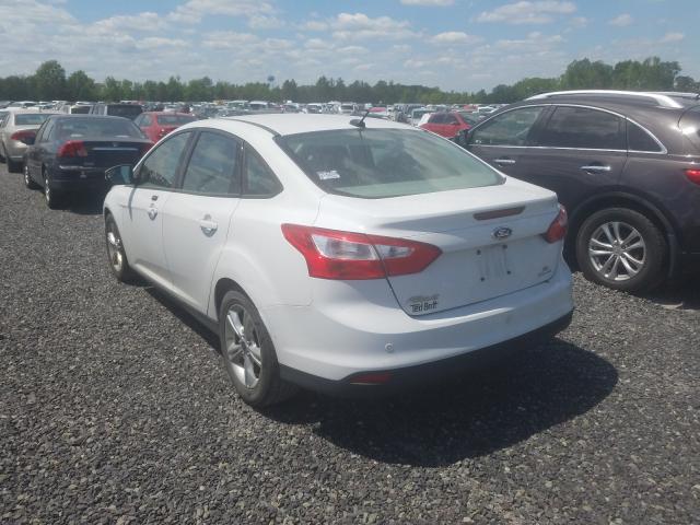 Photo 2 VIN: 1FADP3F27EL304803 - FORD FOCUS SE 