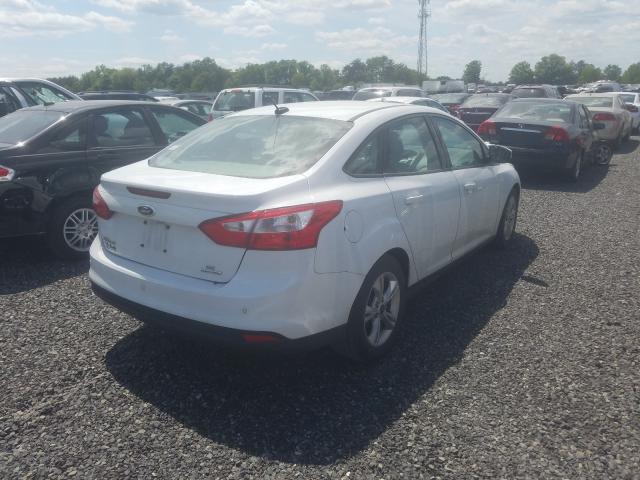 Photo 3 VIN: 1FADP3F27EL304803 - FORD FOCUS SE 