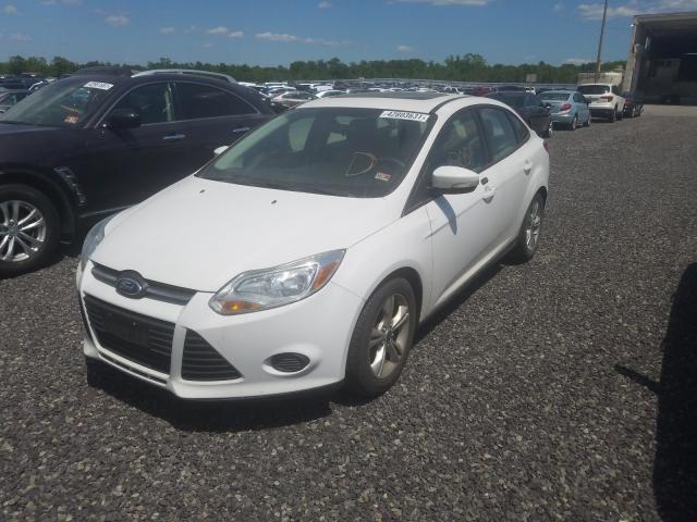 Photo 8 VIN: 1FADP3F27EL304803 - FORD FOCUS SE 