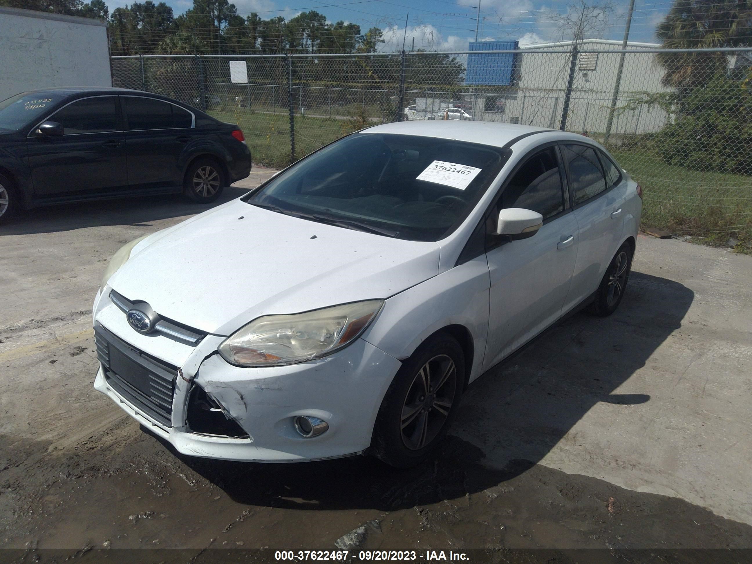 Photo 1 VIN: 1FADP3F27EL309502 - FORD FOCUS 