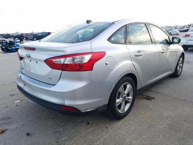 Photo 3 VIN: 1FADP3F27EL334495 - FORD FOCUS SE 