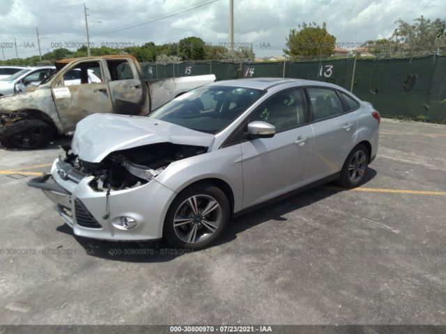 Photo 1 VIN: 1FADP3F27EL387620 - FORD FOCUS 