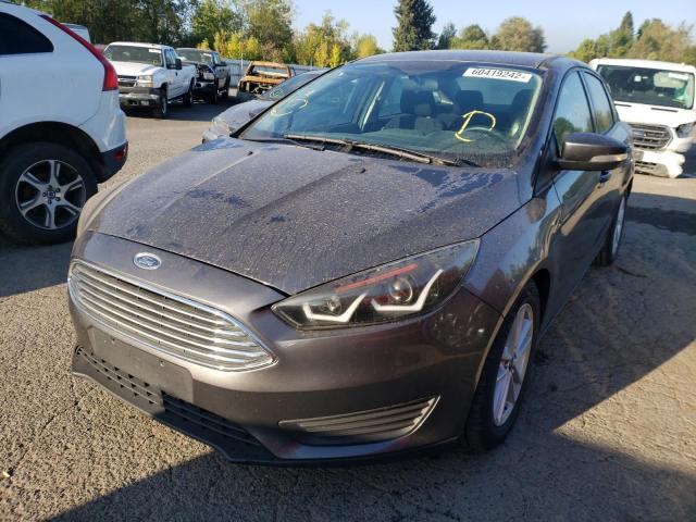 Photo 1 VIN: 1FADP3F27FL358653 - FORD FOCUS SE 