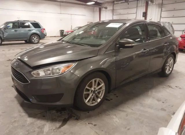 Photo 1 VIN: 1FADP3F27GL201853 - FORD FOCUS 