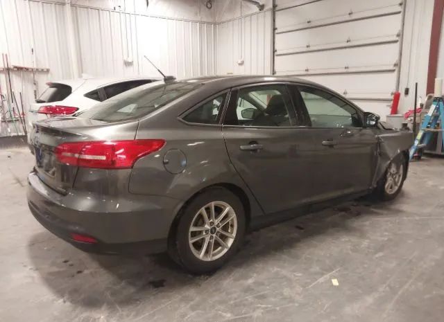 Photo 3 VIN: 1FADP3F27GL201853 - FORD FOCUS 