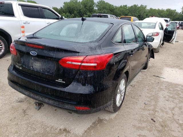 Photo 3 VIN: 1FADP3F27GL202985 - FORD FOCUS SE 