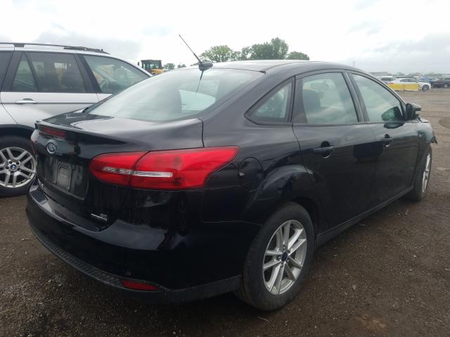 Photo 3 VIN: 1FADP3F27GL211427 - FORD FOCUS SE 