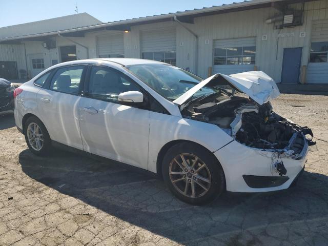 Photo 3 VIN: 1FADP3F27GL214392 - FORD FOCUS SE 