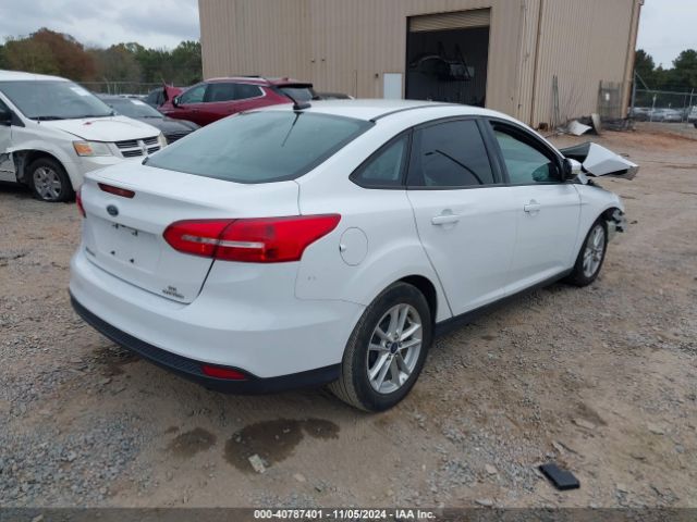 Photo 3 VIN: 1FADP3F27GL217969 - FORD FOCUS 