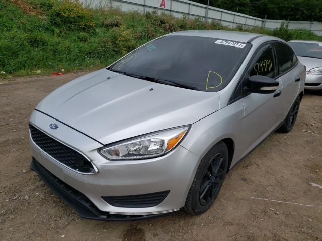 Photo 1 VIN: 1FADP3F27GL225005 - FORD FOCUS SE 