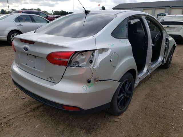 Photo 3 VIN: 1FADP3F27GL225005 - FORD FOCUS SE 