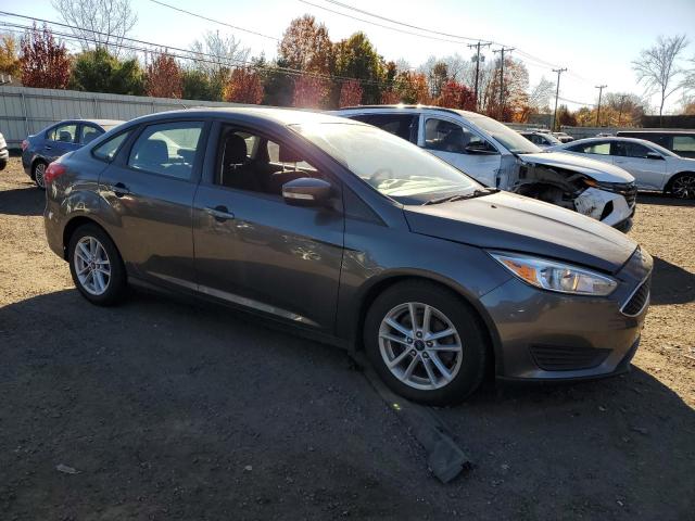 Photo 3 VIN: 1FADP3F27GL227935 - FORD FOCUS SE 