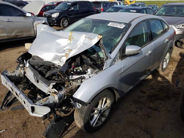 Photo 1 VIN: 1FADP3F27GL234948 - FORD FOCUS SE 