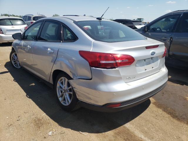 Photo 2 VIN: 1FADP3F27GL244587 - FORD FOCUS 