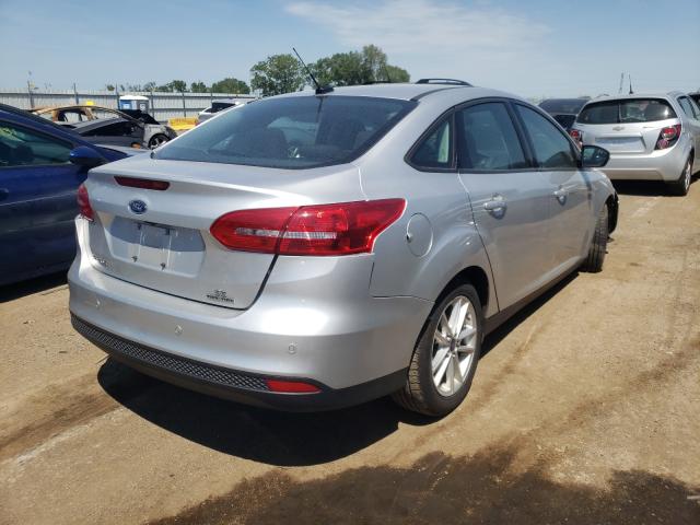 Photo 3 VIN: 1FADP3F27GL244587 - FORD FOCUS 