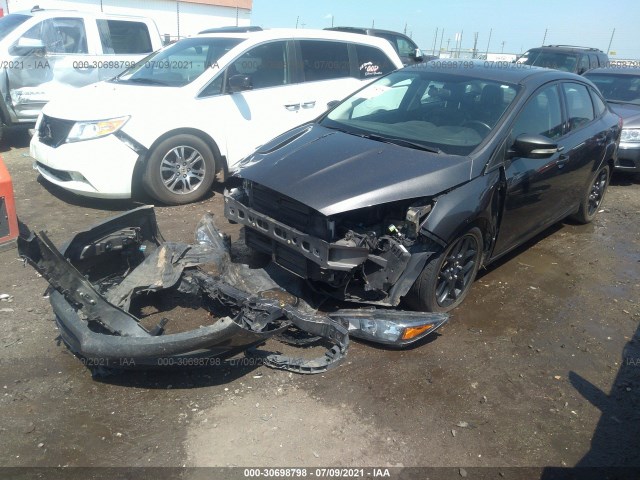 Photo 1 VIN: 1FADP3F27GL249627 - FORD FOCUS 