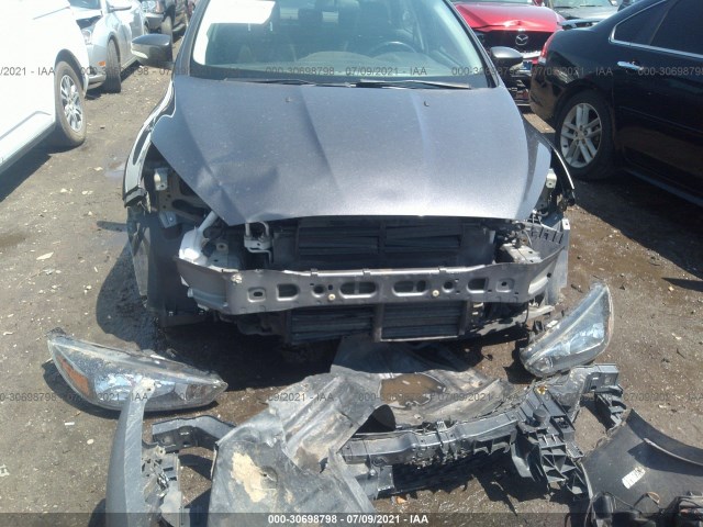 Photo 5 VIN: 1FADP3F27GL249627 - FORD FOCUS 