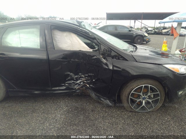 Photo 5 VIN: 1FADP3F27GL249689 - FORD FOCUS 