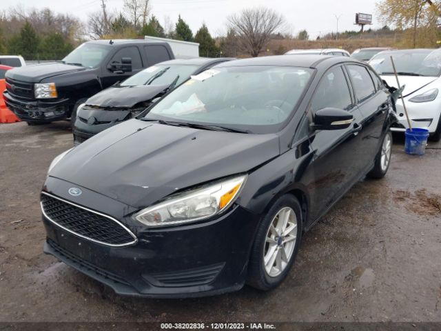 Photo 1 VIN: 1FADP3F27GL252950 - FORD FOCUS 