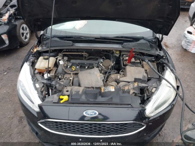 Photo 9 VIN: 1FADP3F27GL252950 - FORD FOCUS 