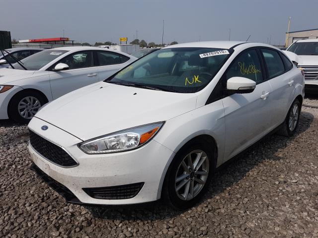 Photo 1 VIN: 1FADP3F27GL253435 - FORD FOCUS SE 