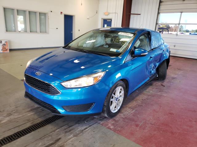 Photo 1 VIN: 1FADP3F27GL266914 - FORD FOCUS SE 