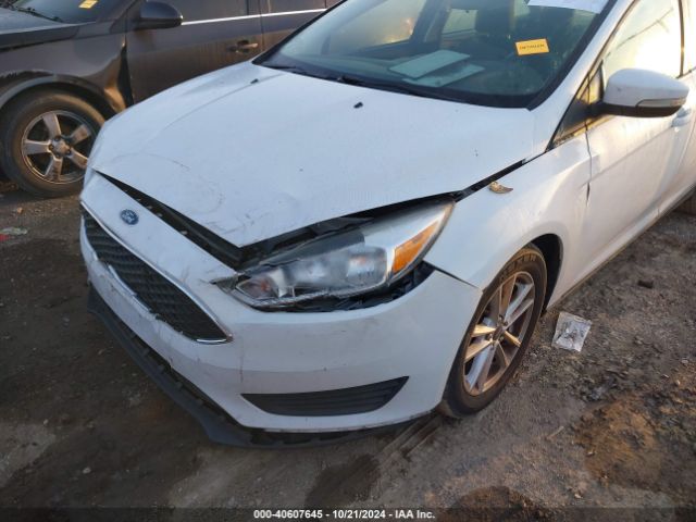 Photo 5 VIN: 1FADP3F27GL280716 - FORD FOCUS 