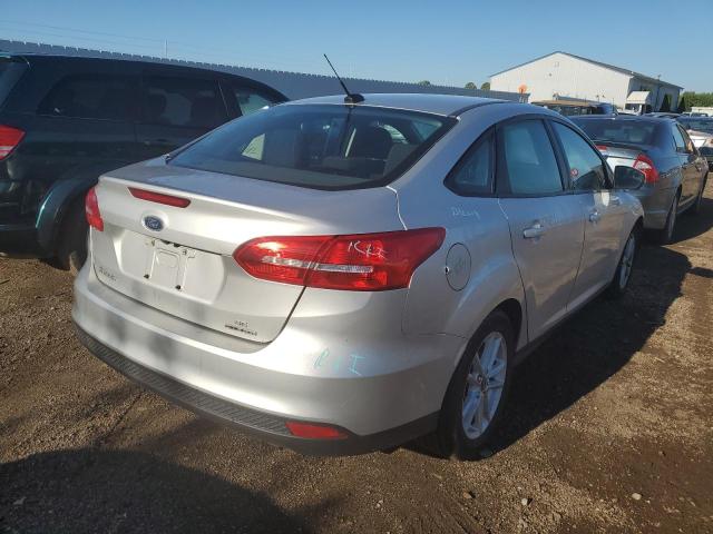 Photo 3 VIN: 1FADP3F27GL293093 - FORD FOCUS SE 