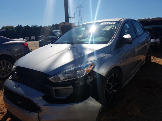 Photo 1 VIN: 1FADP3F27GL296527 - FORD FOCUS SE 