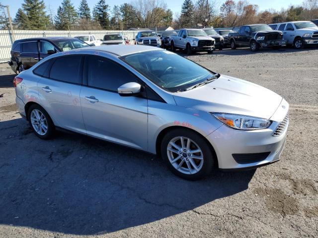 Photo 3 VIN: 1FADP3F27GL300415 - FORD FOCUS SE 