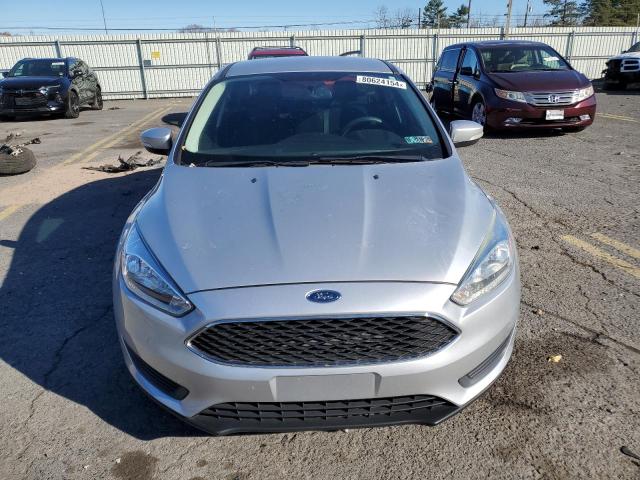 Photo 4 VIN: 1FADP3F27GL300415 - FORD FOCUS SE 