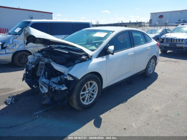 Photo 1 VIN: 1FADP3F27GL305565 - FORD FOCUS 