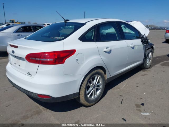 Photo 3 VIN: 1FADP3F27GL305565 - FORD FOCUS 