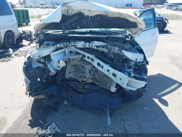 Photo 5 VIN: 1FADP3F27GL305565 - FORD FOCUS 