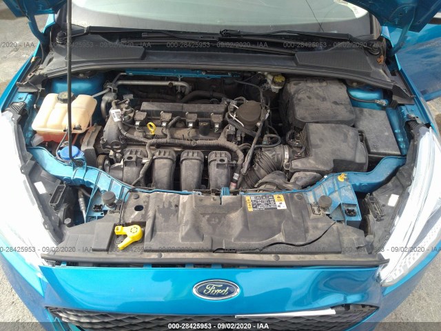 Photo 9 VIN: 1FADP3F27GL306554 - FORD FOCUS 