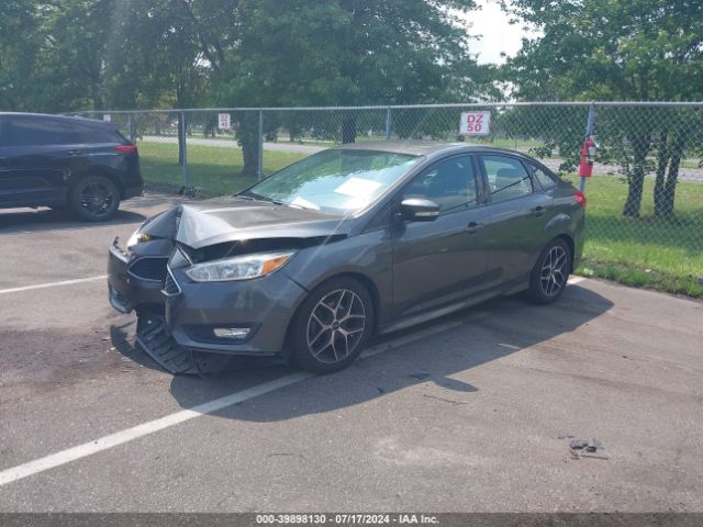 Photo 1 VIN: 1FADP3F27GL308630 - FORD FOCUS 