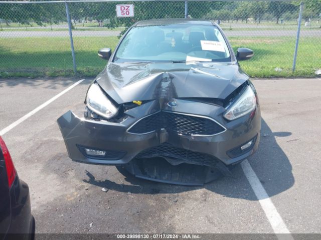 Photo 5 VIN: 1FADP3F27GL308630 - FORD FOCUS 