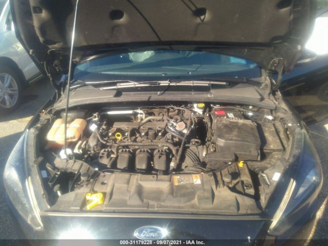 Photo 9 VIN: 1FADP3F27GL330255 - FORD FOCUS 