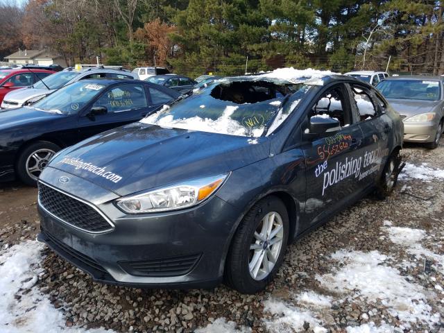 Photo 1 VIN: 1FADP3F27GL361943 - FORD FOCUS SE 