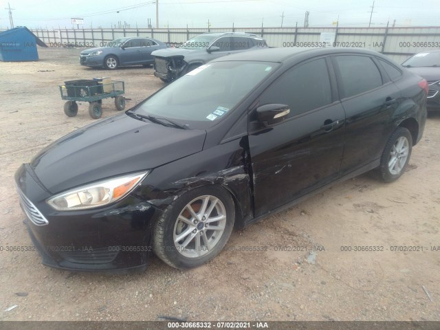 Photo 1 VIN: 1FADP3F27GL368973 - FORD FOCUS 