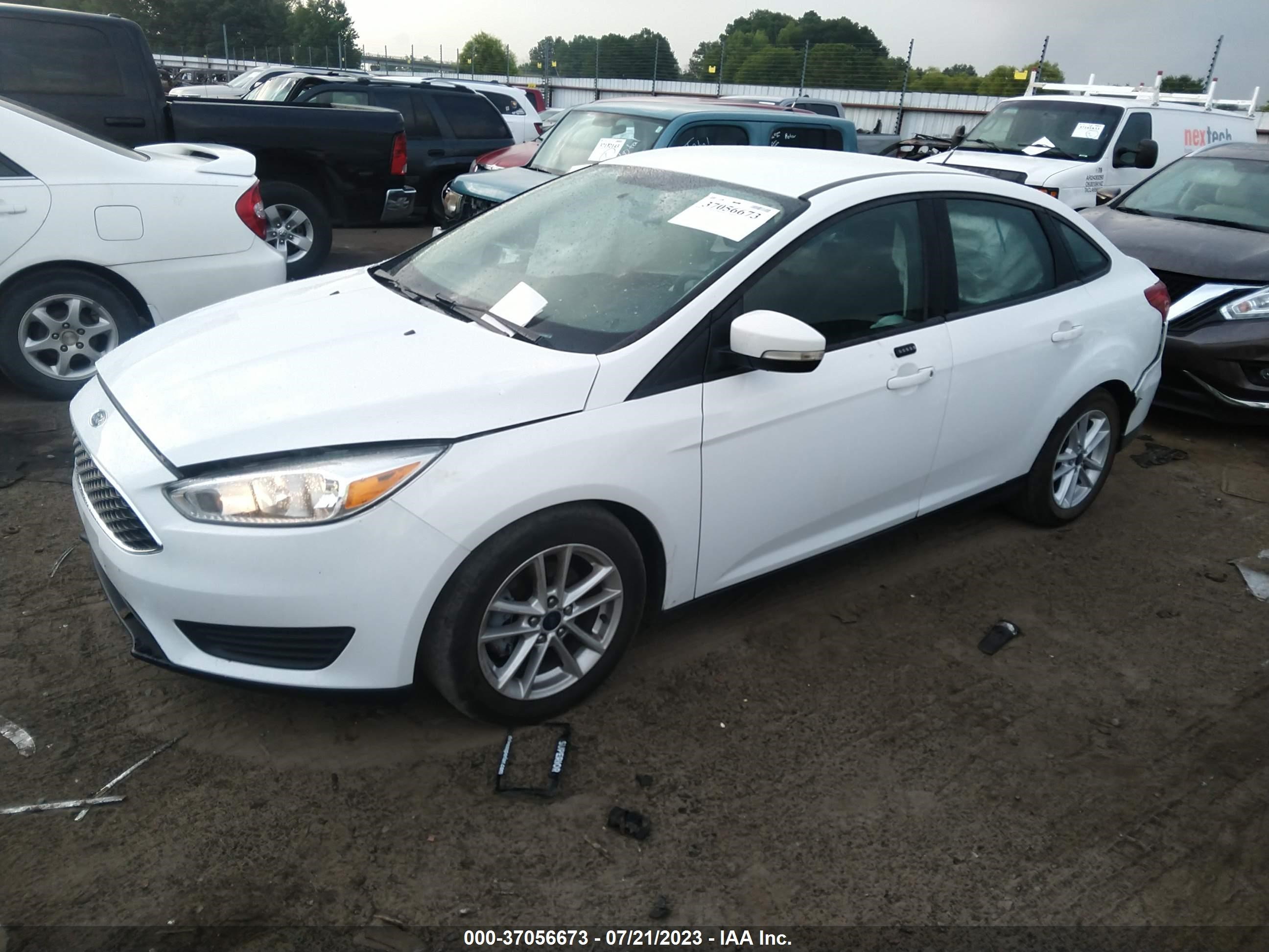 Photo 1 VIN: 1FADP3F27GL372991 - FORD FOCUS 