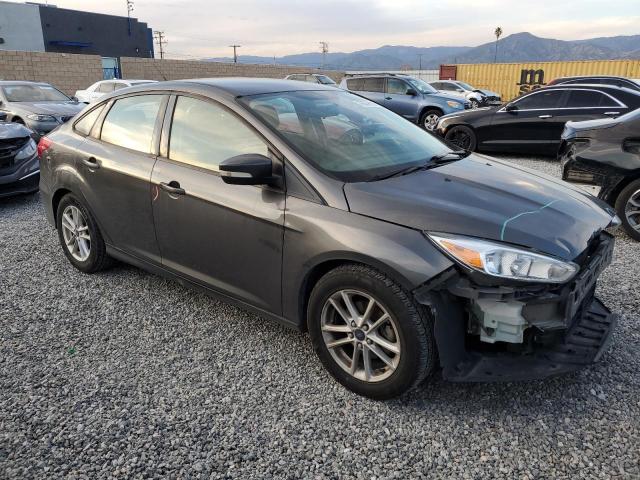 Photo 3 VIN: 1FADP3F27GL374496 - FORD FOCUS SE 