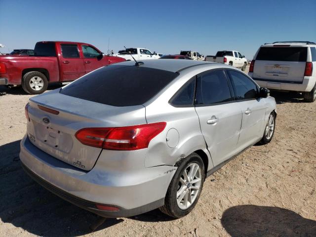 Photo 2 VIN: 1FADP3F27GL379018 - FORD FOCUS SE 