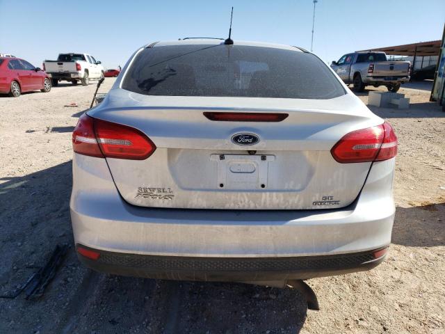 Photo 5 VIN: 1FADP3F27GL379018 - FORD FOCUS SE 