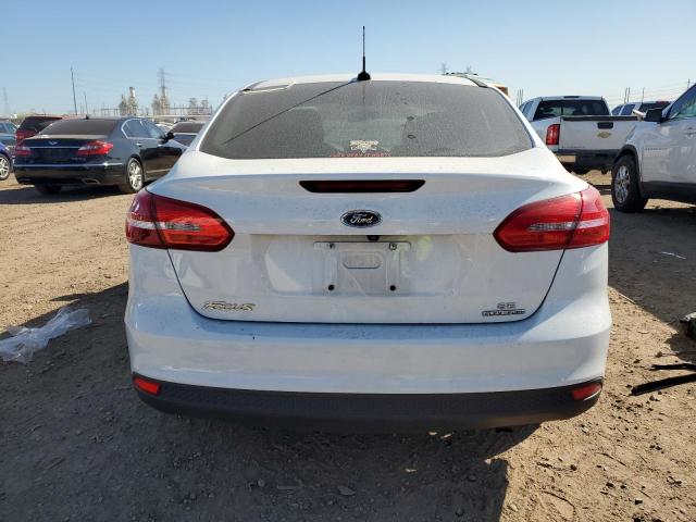 Photo 5 VIN: 1FADP3F27GL380296 - FORD FOCUS SE 