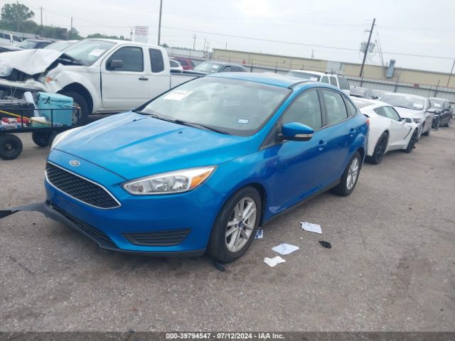 Photo 1 VIN: 1FADP3F27GL393548 - FORD FOCUS 