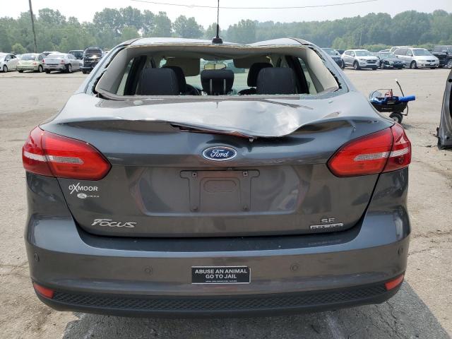 Photo 5 VIN: 1FADP3F27GL394425 - FORD FOCUS SE 